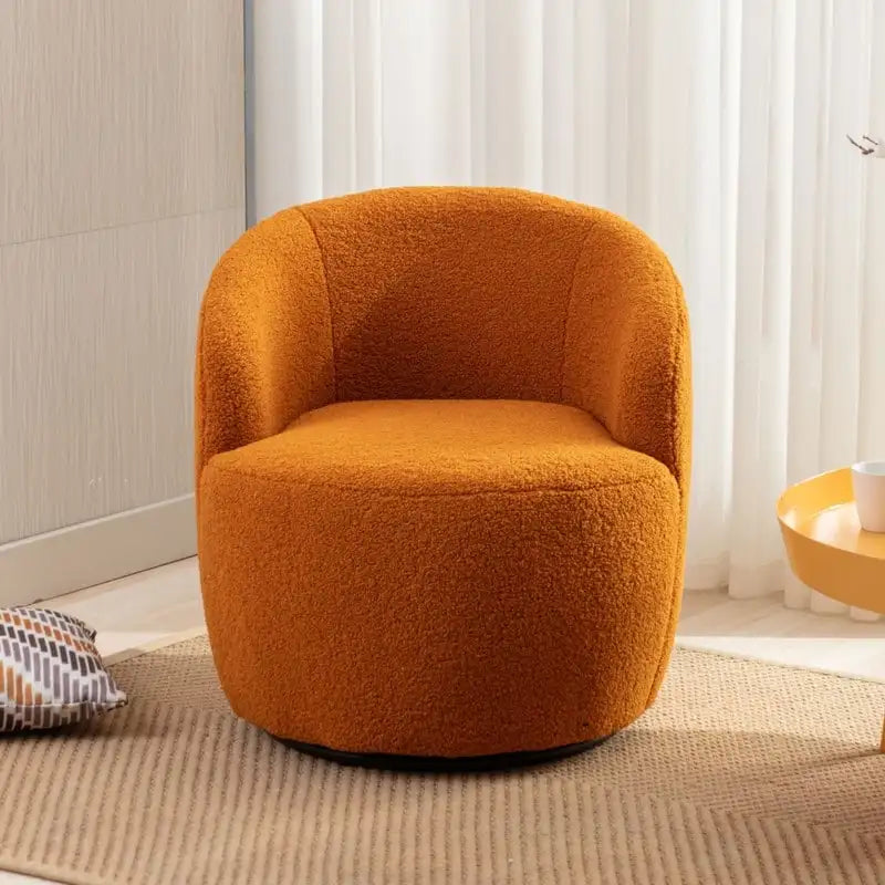 Fauteuil pivotant en tissu bouclette avec anneau en métal thermolaqué