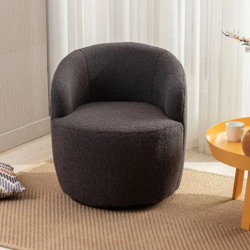 Fauteuil pivotant en tissu bouclette avec anneau en métal thermolaqué