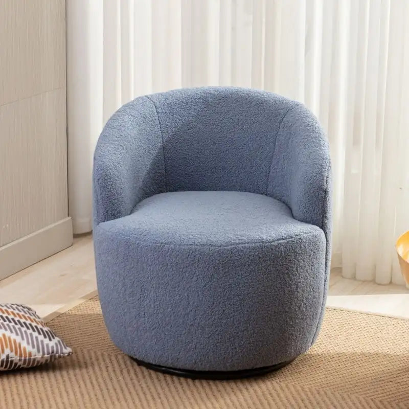 Fauteuil pivotant en tissu bouclette avec anneau en métal thermolaqué