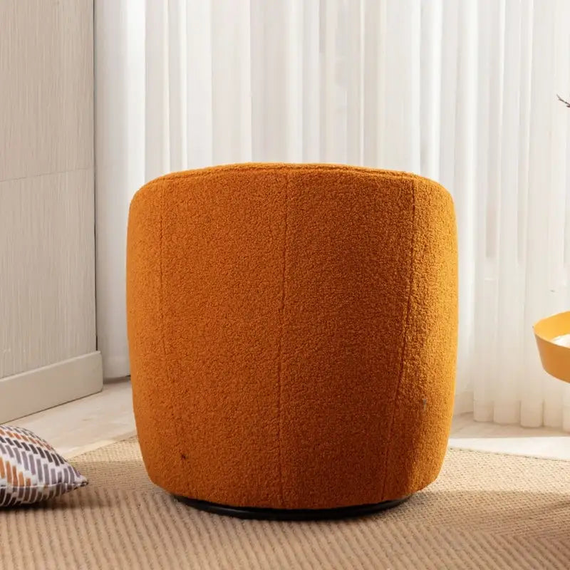 Fauteuil pivotant en tissu bouclette avec anneau en métal thermolaqué