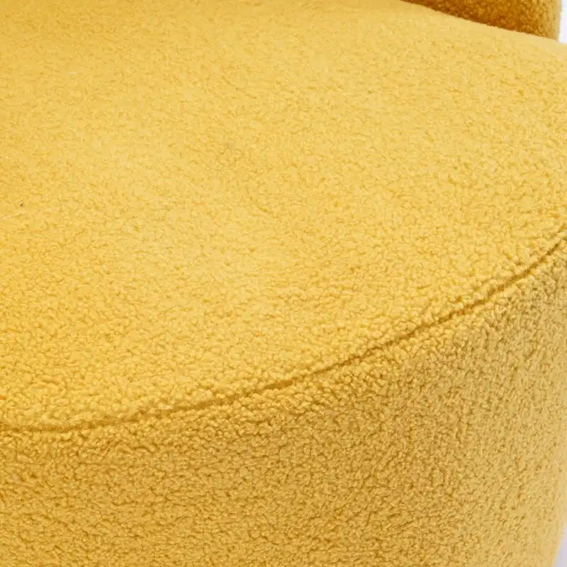 Fauteuil pivotant en tissu bouclette avec anneau en métal thermolaqué